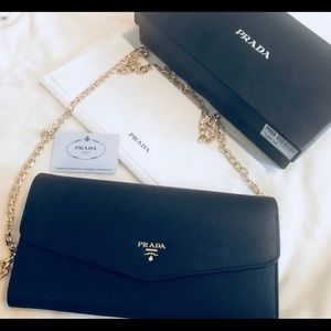 New Prada Clutch never been used.